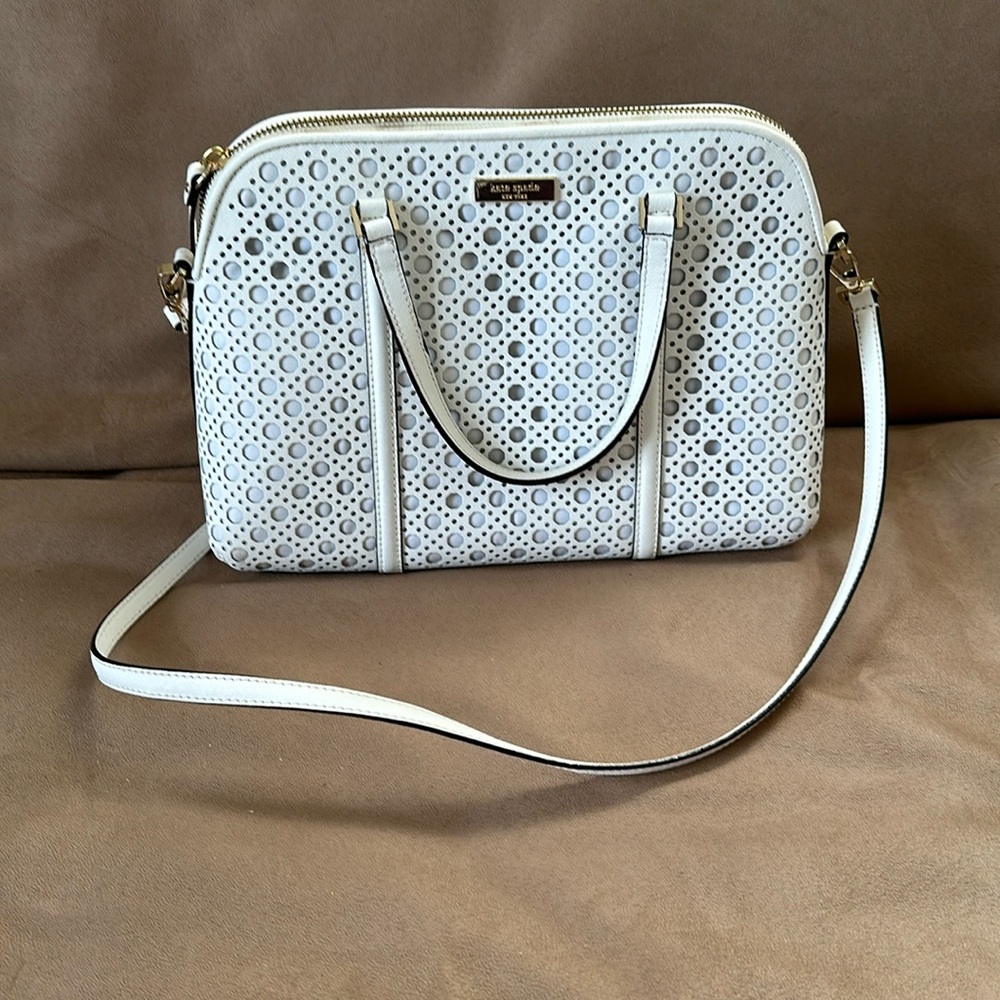 Kate Spade while leather bag.